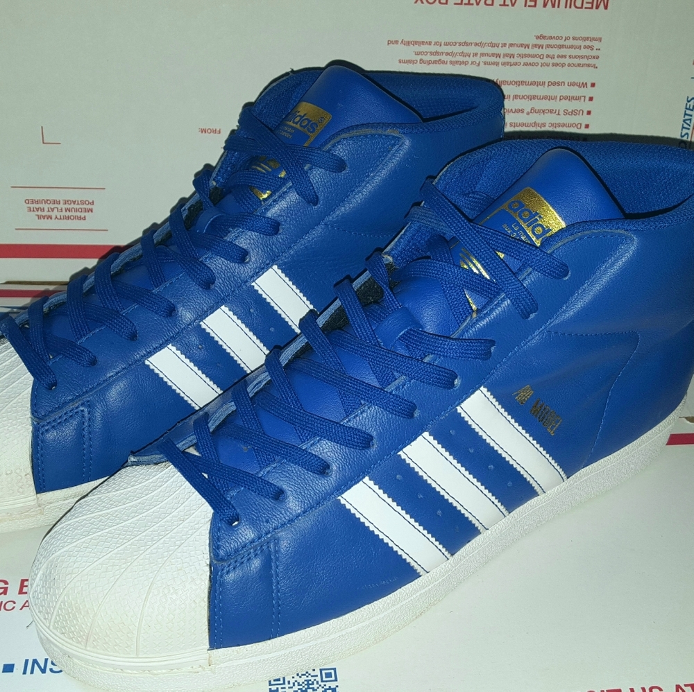 Adidas men's size 11 and 1/2 mid tops